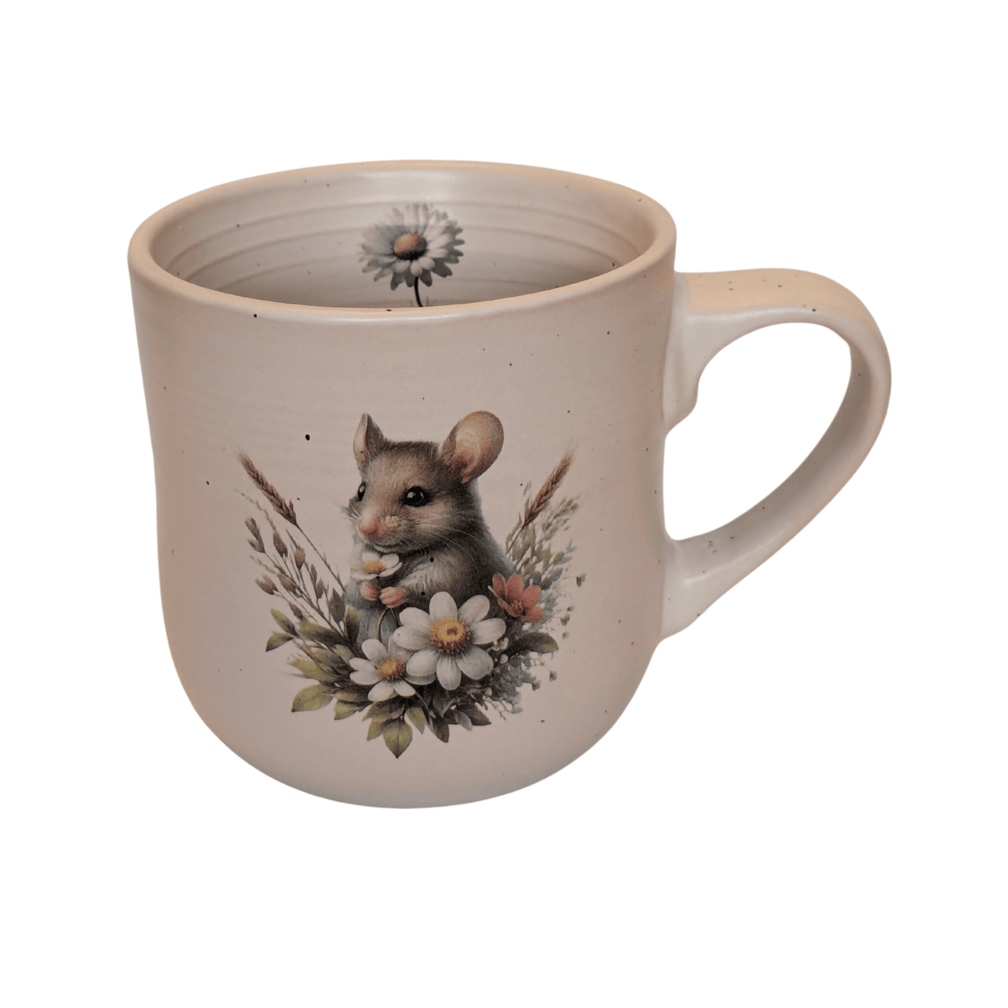 A stoneware mug with an image of a mouse holding a bunch of flowers and a small daisy motif on the inner mug.