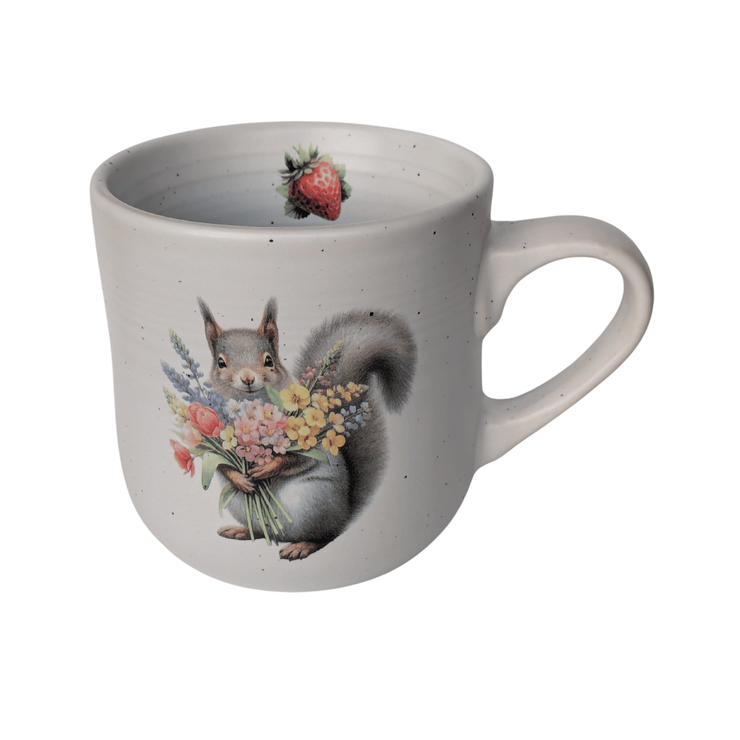 A stoneware mug with an image of a squirrel holding a bunch of flowers and a small strawberry motif on the inner mug.