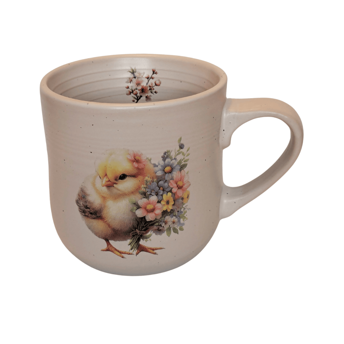 A stoneware mug with an image of a chick holding a bunch of flowers and a small blossom motif on the inner mug.